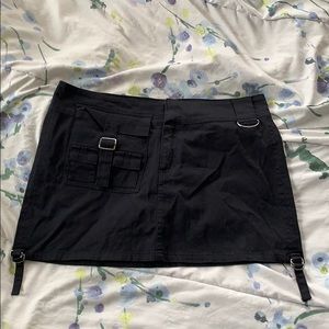 black buckled mini-skirt